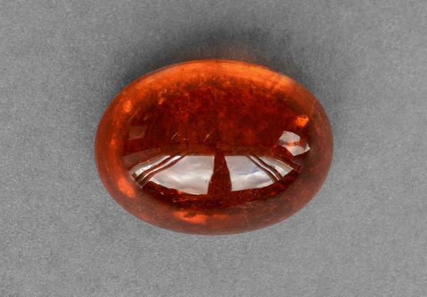 Oval spessartine garnet cabochon for ring 17.89 ct