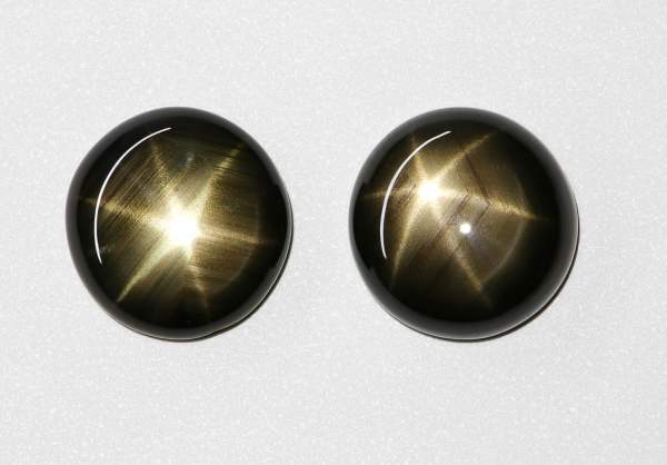 Pair of round-shaped star sapphire cabochons 7.96 ct