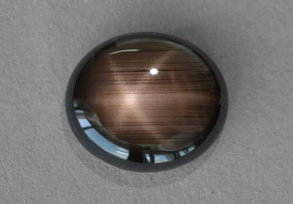 Oval-shaped black sapphire cabochon 12.92 ct