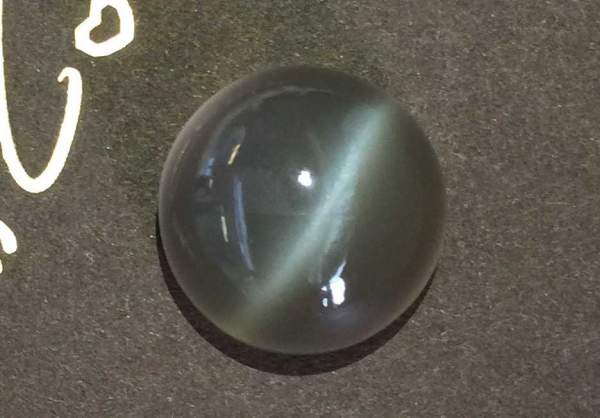 Gray moonstone with a cat's eye 15.62 ct