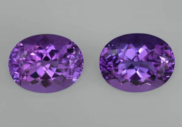 Pair of large oval cut amethysts 31.09 ct