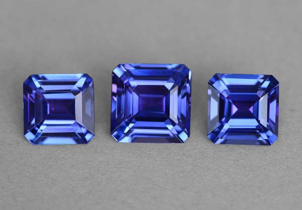 Emerald cut tanzanite set 11.77 ct