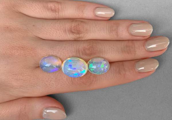 Set of natural white opal cabochons 22.91 ct